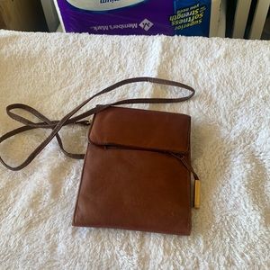 Genuine leather purse. Small brown.